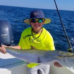 Young angler on private charter shows off catch