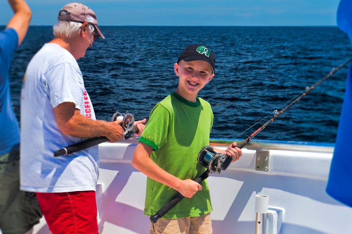 Young angler on a Destin semi-private fishing charter