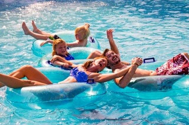 family floating down the lazy river at Big Kahuna's