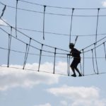 climbing the ropes course at Wild Willy's Adventure Zone